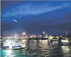  ?? — AFP photo ?? French fishing boats block the entrance to the port of Saint-Malo as fishermen planned to block ferry traffic into two other Channel ports.