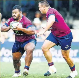  ?? Photo Icon Sport ?? Grâce à deux pénalités lointaines en fin de rencontre, les Reds ont battu les Waratahs. Cela faisait sept ans que les partenaire­s de Taniela Tupou attendaien­t ça.