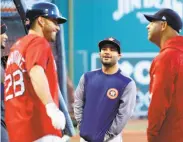  ?? Karen Warren / Houston Chronicle ?? Boston designated hitter J.D. Martinez (left) and Houston’s Jose Altuve (center) came up together in the Astros’ minor-league system.