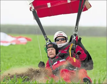  ?? Pictures: Cpl Robert Weidman/Richard Watt ?? Jock Hutton parachuted into France for a final time last year