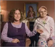  ?? HULU ?? Patricia Arquette, left, and Joey King star in “The Act,” a Hulu film based on a true story.