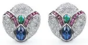  ??  ?? A pair of diamond Mauboussin earrings set in 18k white gold with an emerald centerpiec­e joined with a ruby curved on both sides finished by a drop of blue sapphire