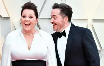  ??  ?? Oscar nominee Melissa McCarthy and her husband, Ben Falcone, at this year’s awards.