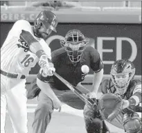  ?? Mark J. Terrill Associated Press ?? ANDRE ETHIER HITS a two-run homer to give the Dodgers a 4-1 lead. Then he made a great play in right field.