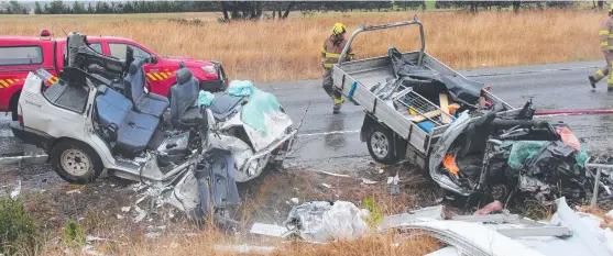  ?? ?? Emergency services attend the fatal crash on the Bass Highway last year.