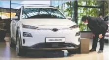  ?? SEONGJOON CHO/BLOOMBERG FILES ?? Hyundai's global recall affects electric Kona crossovers, Ioniq compact cars and Elec City buses that were manufactur­ed from November 2017 to March 2020.