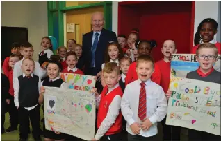  ??  ?? Jim McShane and pupils from St John Paul II Primary Picture: Kirsty Anderson