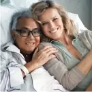  ??  ?? Poignant: Eva Herzigova visits Tang in hospital