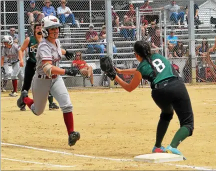  ?? DEBBY HIGH — FOR DIGITAL FIRST MEDIA ?? Dock Mennonite’s Jules Rotelle covers first base as a Pine Grove player approaches during their PIAA Class 3A quarterfin­al Thursday.