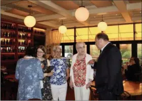  ?? SUBMITTED PHOTO ?? State Senator Daylin Leach chats with local librarians and their guests at Leach’s 10th annual Librarian of the Year Award Ceremony on Monday, June 10, 2019, at Pietro’s Coal Oven Pizzeria in Radnor.