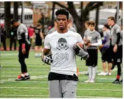  ?? MIKE CRAVEN / AMERICAN-STATESMAN ?? Yoakum wide receiver Joshua Moore will take an official visit to Texas this weekend. His twin brother, Jordan, is committed to Texas A&amp;M.