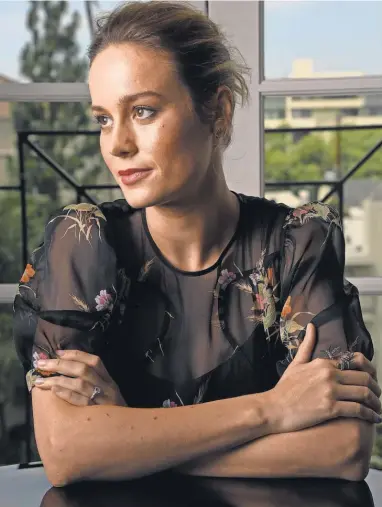  ?? ROBERT HANASHIRO, USA TODAY ?? Brie Larson portrays a journalist who had a harsh upbringing in The Glass Castle, out Friday. Larson will next move into the role of Captain Marvel.