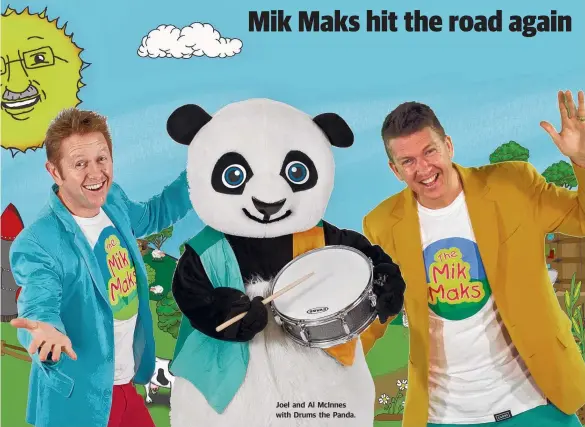  ??  ?? Joel and Al McInnes with Drums the Panda.