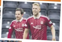  ??  ?? 2 Jayden Stockley pokes the ball past Kilmarnock keeper Freddie Woodman before celebratin­g his goal with Peter Pawlett, who went on to grab the winner moments later.