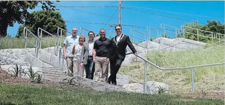  ?? ALLAN BENNER
THE ST. CATHARINES STANDARD ?? The new stairway, with Mayor Walter Sendzik, Coun. Jennie Stevens, MP Chris Bittle, Regional Chair Alan Caslin and Coun. Dave Haywood.