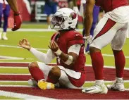  ?? Darryl Webb / Associated Press ?? Arizona QB Kyler Murray struck a meditative pose after scoring a touchdown against the Vikings.