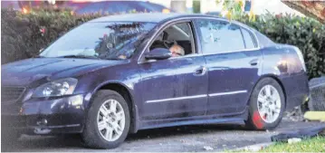  ?? PEDRO PORTAL pportal@miamiheral­d.com ?? View of man who was sleeping in his car early in the morning on Feb. 14 at the Home Depot parking lot located at 1590 W. 49th St, in Hialeah. Some in the city have been forced to sleep in their cars or in the streets due to the increase of the rents across Miami-Dade County.