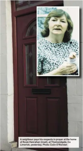  ??  ?? A neighbour pays his respects in prayer at the home of Rosie Hanrahan (inset), at Thomondgat­e, Co Limerick, yesterday. Photo: Colin O’Riordan