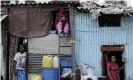  ?? Photograph: Rajanish Kakade/AP ?? People in their shanties at Dharavi during the coronaviru­s lockdown in Mumbai.