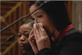  ?? SHURAN HUANG — THE NEW YORK TIMES ?? Witness Linda De La Rosa reacts while testifying during a hearing to examine sexual abuse of female inmates in federal prisons at the Capitol in Washington on Tuesday.