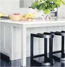  ??  ?? One key to planning a great kitchen island, Betsy Burnham says, is leaving plenty of legroom for barstool seating along one side.