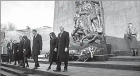  ?? AP/MICHAEL SOHN ?? Israeli Prime Minister Benjamin Netanyahu (from left), Polish Prime Minister Mateusz Morawiecki and U.S. Vice President Mike Pence, along with their wives, leave the Monument to the Ghetto Heroes during a wreath-laying ceremony Thursday in Warsaw.