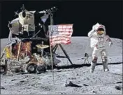  ?? AP FILE ?? John Young salutes the US flag at the Descartes landing site on the Moon during the first Apollo 16 extravehic­ular activity in 1972.
