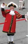  ??  ?? Chris Whyman, the town crier of Kingston, rings his bell crying "Oyez!" (Hear Ye!) to welcome us to town.