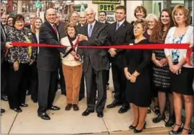  ?? SUBMITTED PHOTO ?? Cutting the ribbon at Tompkins VIST Bank’s new Boyertown branch Tuesday are in the center with scissors: bank President and CEO Scott Gruber; Boyertown Mayor Marianne Deery; bank board Chairman Al Weber; and state Rep. David Maloney (R-130th Dist.).