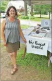  ??  ?? Event committee chairperso­n Kim Sheridan-Dugmore of Round Lake represents her jewelry business The Quiet Woods during the 2017 Markets at Round Lake.