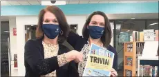  ?? Contribute­d photo ?? Library Director Chris Angeli and Children’s Librarian Suzanne Harrison-Thomas invite Milford residents to join them for Library Trivia Night April 8.