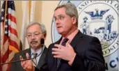  ?? KATE MUNSCH / REUTERS ?? San Francisco City Attorney Dennis Herrera (right) and Mayor Ed Lee announce they have filed a lawsuit against US President Donald Trump over his executive order targeting sanctuary cities during a news conference on Monday.