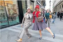  ?? REUTERS/BERNADETT SZABO /FILE PHOTO ?? People attend the Silly Walk Parade, emulating a sketch from British comedy group Monty Python’s television series to mark April Fool’s day in Budapest, Hungary, last April.