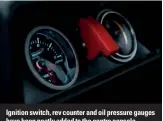  ??  ?? Ignition switch, rev counter and oil pressure gauges have been neatly added to the centre console.