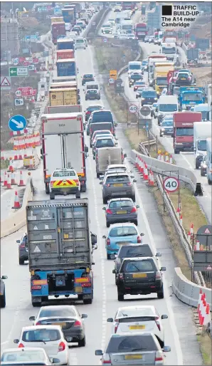  ??  ?? TRAFFIC BUILD-UP: The A14 near Cambridge