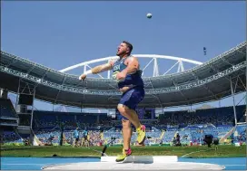  ?? DOUG MILLS / THE NEW YORK TIMES 2016 ?? His sport isn’t just eating and muscle building. Joe Kovacs (seen during his silver-medal performanc­e at the Rio de Janeiro Olympics in 2016) says of his technique: “When the ball comes out, the angle and velocity is just a physics problem. If you can put the velocity behind it, you’re going to have a good throw.”