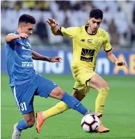  ?? — Supplied photo ?? Al Nasr and Al Wasl players vie for the ball.