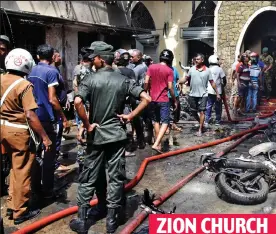  ??  ?? Chaos: At least 2 died at church in east coast city of Batticaloa