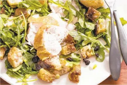  ?? CARL TREMBLAY/AMERICA’S TEST KITCHEN ?? San Francisco’s Zuni Cafe serves roast chicken with a warm bread salad.