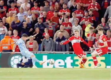  ?? Reuters ?? ↑
Coventry City’s Gustavo Hamer scores a goal against Middlesbro­ugh during their Championsh­ip semi-final match.