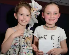  ??  ?? Amanda Lichorobie­c and Hailey Enright part of the Paper Queen entry from winners Millstreet Presentati­on NS.