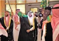  ??  ?? Saudi groom Basil Albani dances with his friends at his home during his wedding in the Red Sea resort of Jeddah.