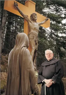 ?? Leah Hennel, Calgary Herald ?? Friar Louis Geelan stands on the grounds of the Mount St. Francis Retreat Centre near Cochrane. The site expects to welcome hundreds today for Good Friday observance­s.