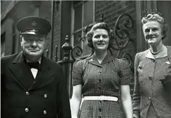  ??  ?? 27 June 1942: Mary with her parents – Winston in his famous yachting cap – on the steps of 10 Downing Street