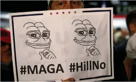  ??  ?? A man shows a Pepe the Frog sign at a Donald Trump rally in Albuquerqu­e, New Mexico, in 2016. Photograph: Carlo Allegri/Reuters