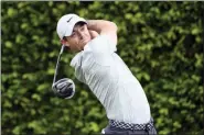  ?? PHELAN M. EBENHACK — THE ASSOCIATED PRESS ?? Rory McIlroy, of Northern Ireland, tees off on the ninth hole during the first round of the Arnold Palmer Invitation­al golf tournament Thursday in Orlando, Fla.