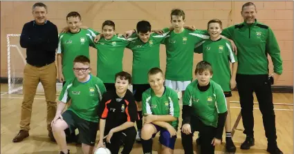  ??  ?? Macroom Cannons U13 Futsal team with coaches Peter Coleman (back left) and Gearoid Griffin (back right).