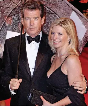  ??  ?? Brosnan with adopted daughter Charlotte in 2006: She died in 2013