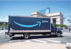  ?? MATT ROURKE/AP FILE ?? Amazon wants to hire 125,000 delivery and warehouse workers and said Tuesday it is paying new hires an average of $18 an hour in a tight job market as more people shop online. The company also is offering pay sign-on bonuses of $3,000 in some parts of the country.