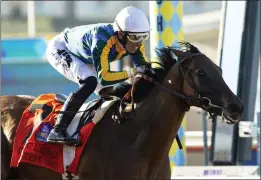  ?? BENOIT PHOTO VIA AP ?? HORSE RACING
Hector Berrios rides Blue Stripe to a victory in the Clement L. Hirsch Stakes last week at Del Mar. It was Berrios’ first Grade I victory in the U.S.